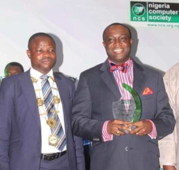 President of NCS, Prof. Sola Aderounmu and IT Man of the Year, Yele Okeremi