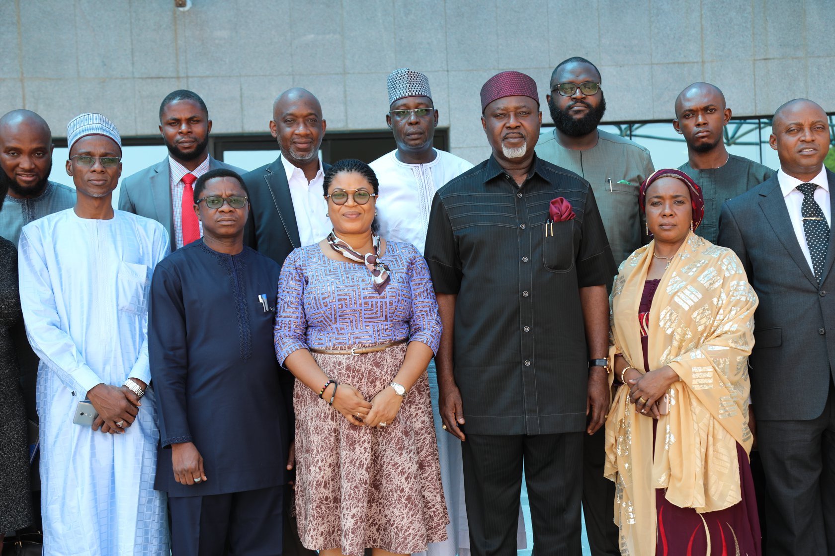 Group photograph of some NIGCOMSAT Board members and management staff.